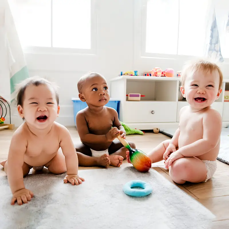 cute babies playing in nursery